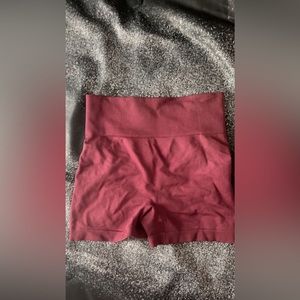 Maroon biker shorts.